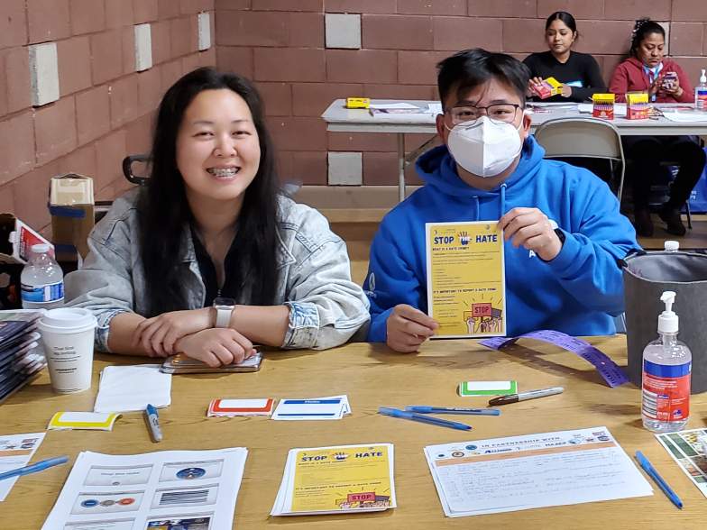 Pictured: two volunteers for Stop the Hate